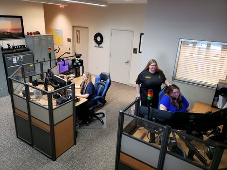 Police Communications Employees in office working